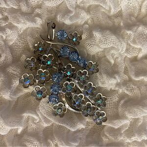 Vintage Sarah Coventry silver brooch with blue flower accents